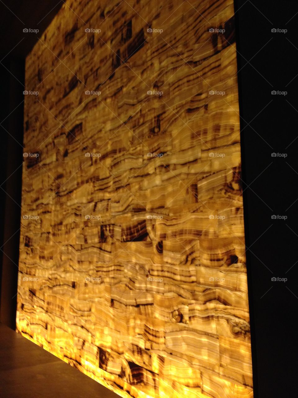 Backlit stone wall
