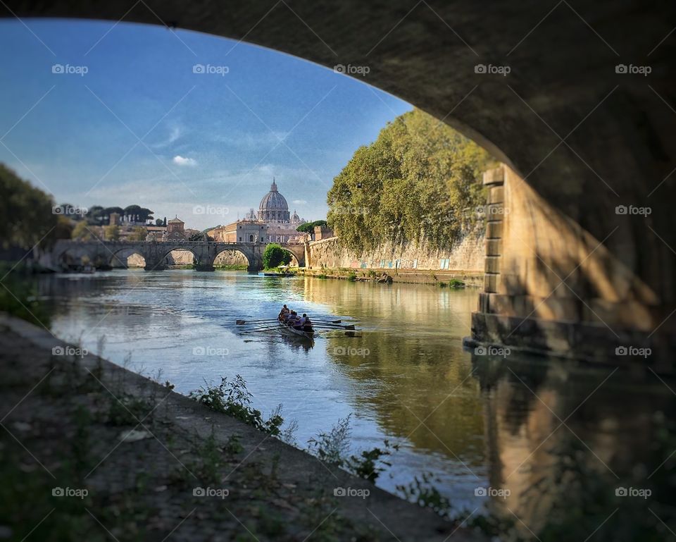 Rowers on Tiber River in Rome, Italy