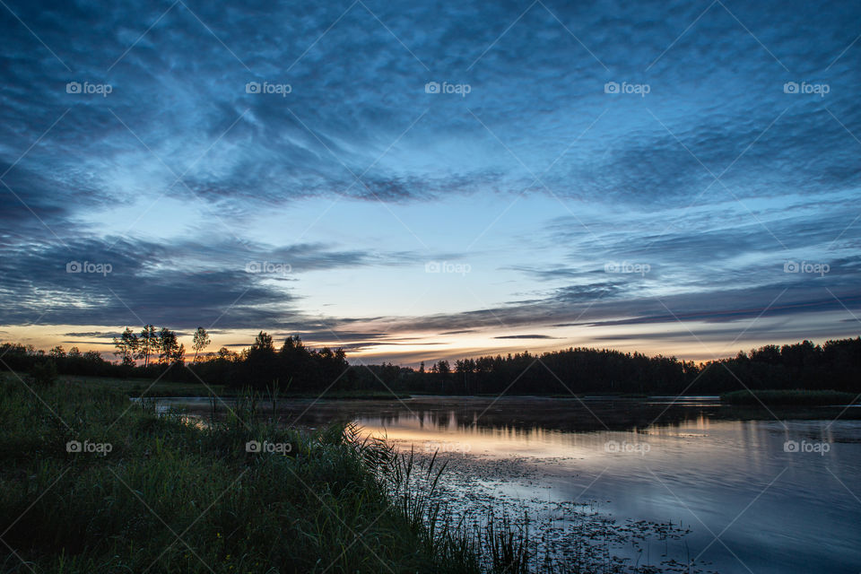 Summer night. Lakes. Sunrise.