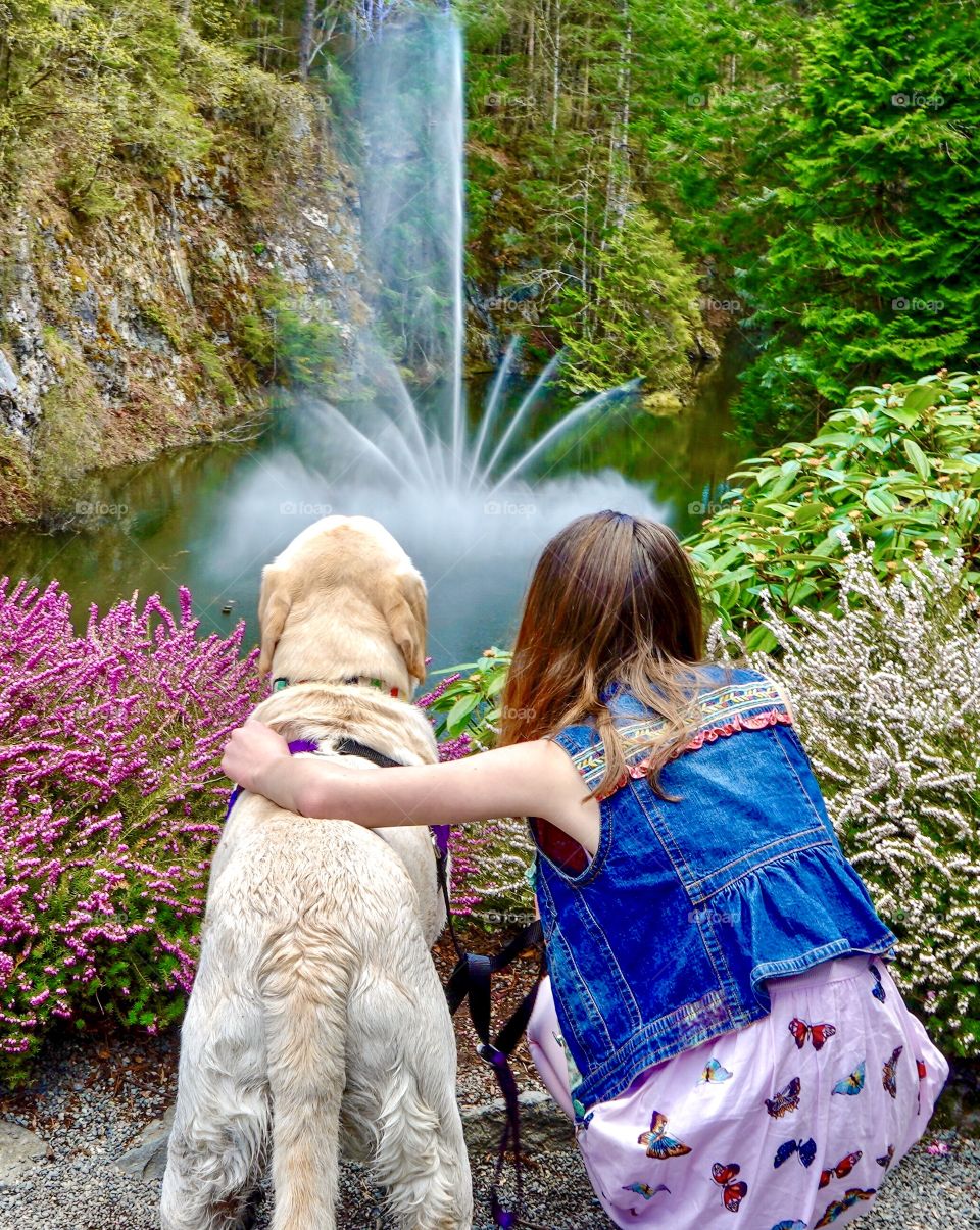 Child and loved dog Labrador retriever 