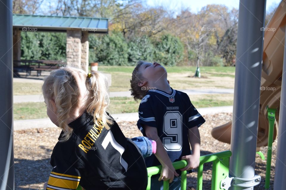 Twins at park playing