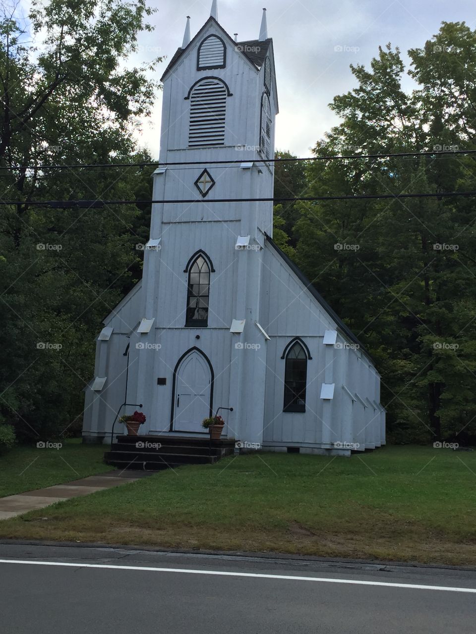 Old white church in Eagles Bay.  Opened only 10 weeks a year over the summer.  Non-denominational Christian services provided by volunteer pastors.