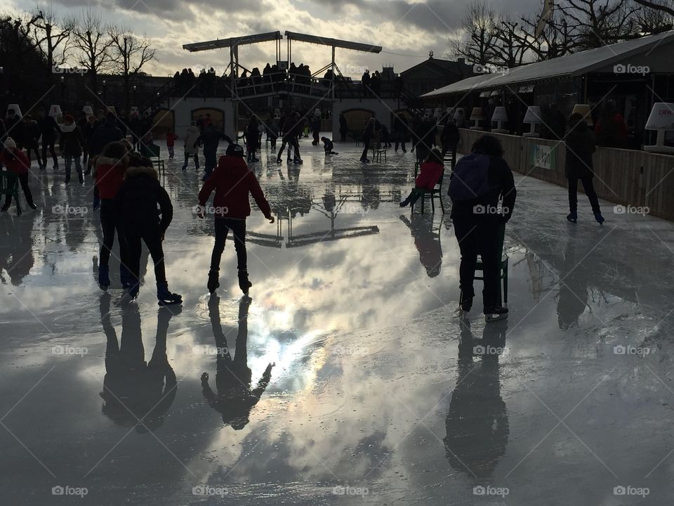 Ice skaters silhouette in Amsterdam 