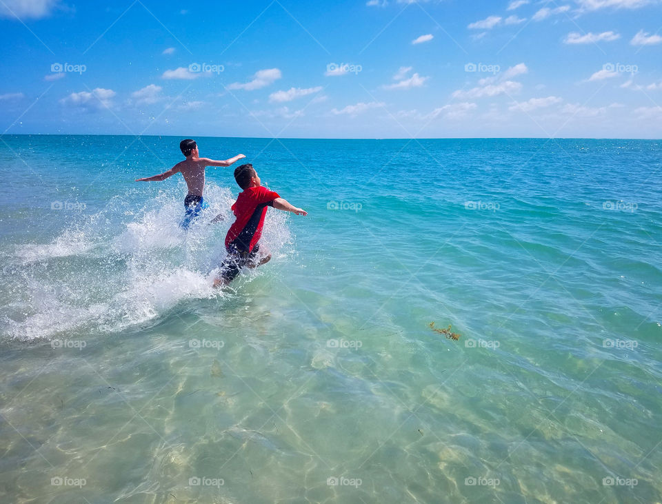 Jumping into fun at the beach