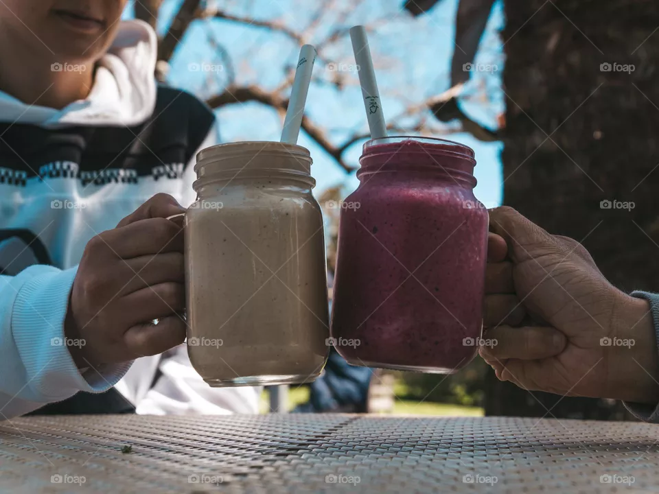 Two people toasting