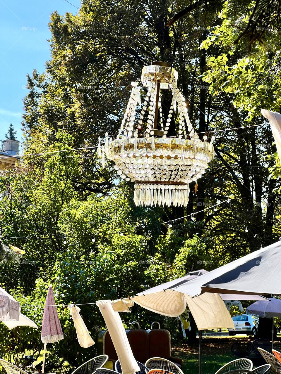 Crystal chandelier on a tree in the park