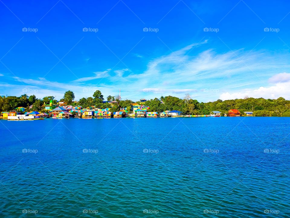 Beautiful view of the Rainbow Village in Tual City with itu blue bay