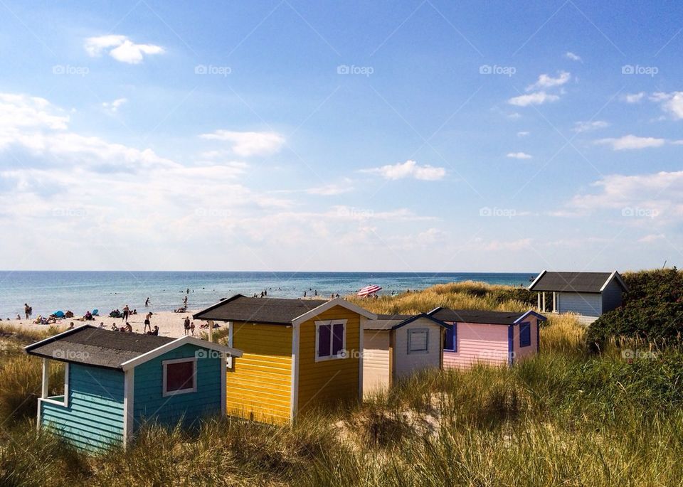 People enjoying at beach in Sweden