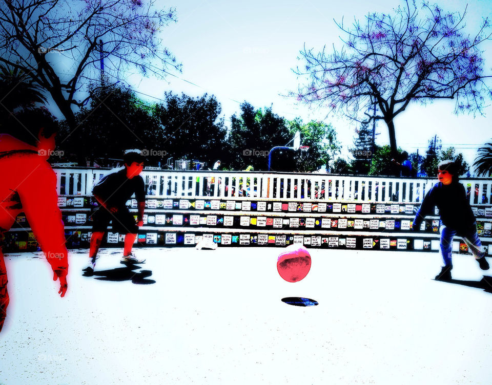 Playground dodgeball hanging suspended in air on an American school