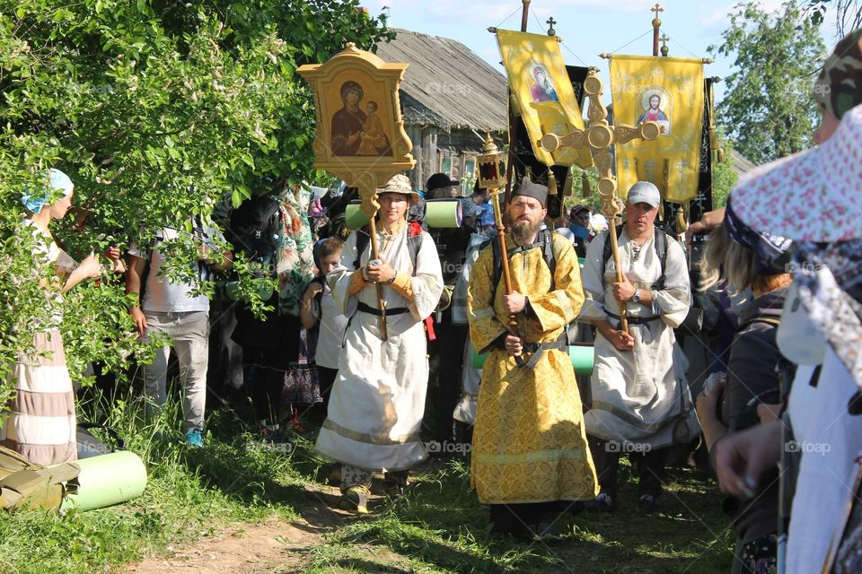 Group of catholic people with cross during parade