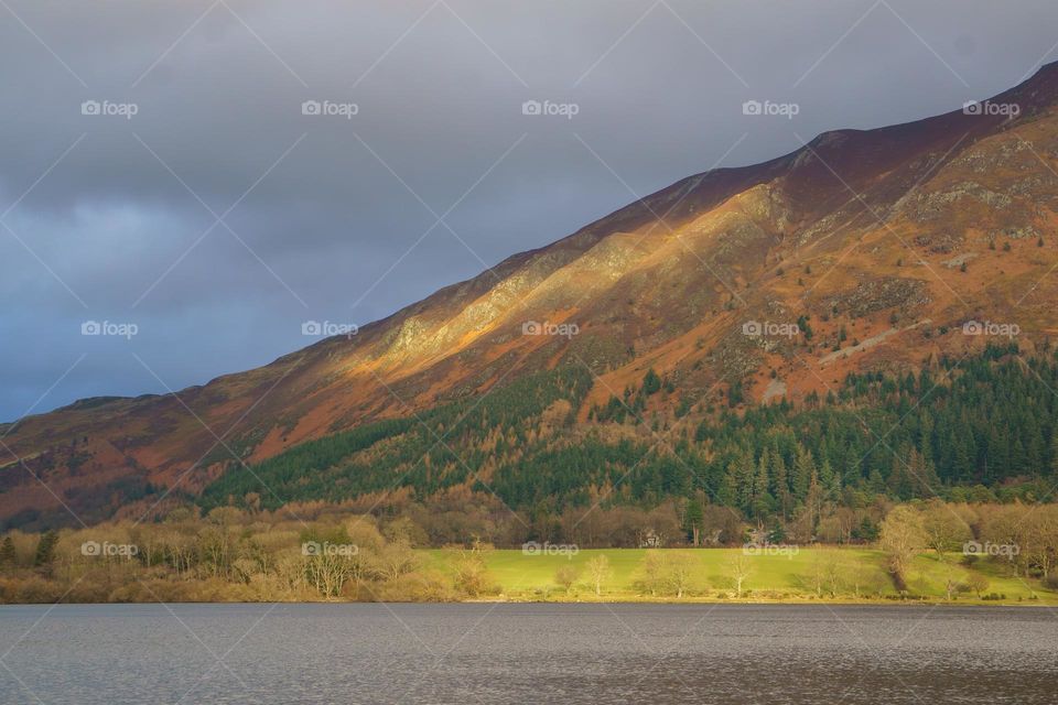 sun light on the Cumbria fells