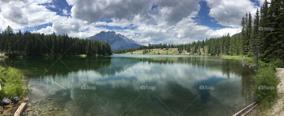 A calming, relaxing, peaceful walk around the serene, glacially blue lake at Johnson Lake in Banff National Park. 