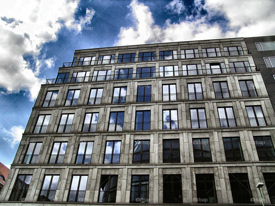 reflection. clouds and modern building in berlin
