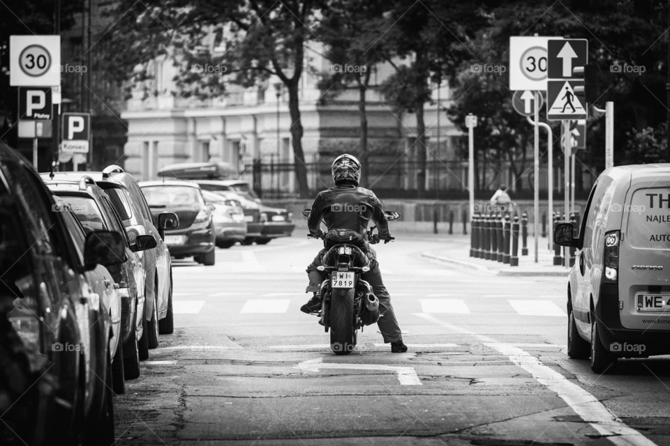 Man on bike at the traffic light