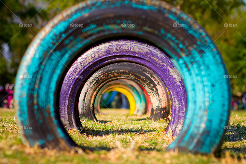circles! playground tires different colors forming circular tunnel