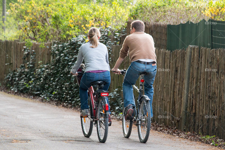 Couple riding bikes