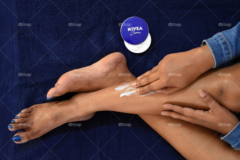 applying nivea cream