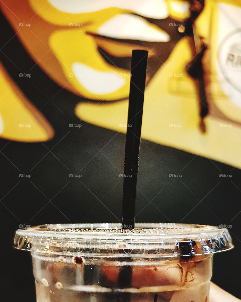 Plastic glass of drink