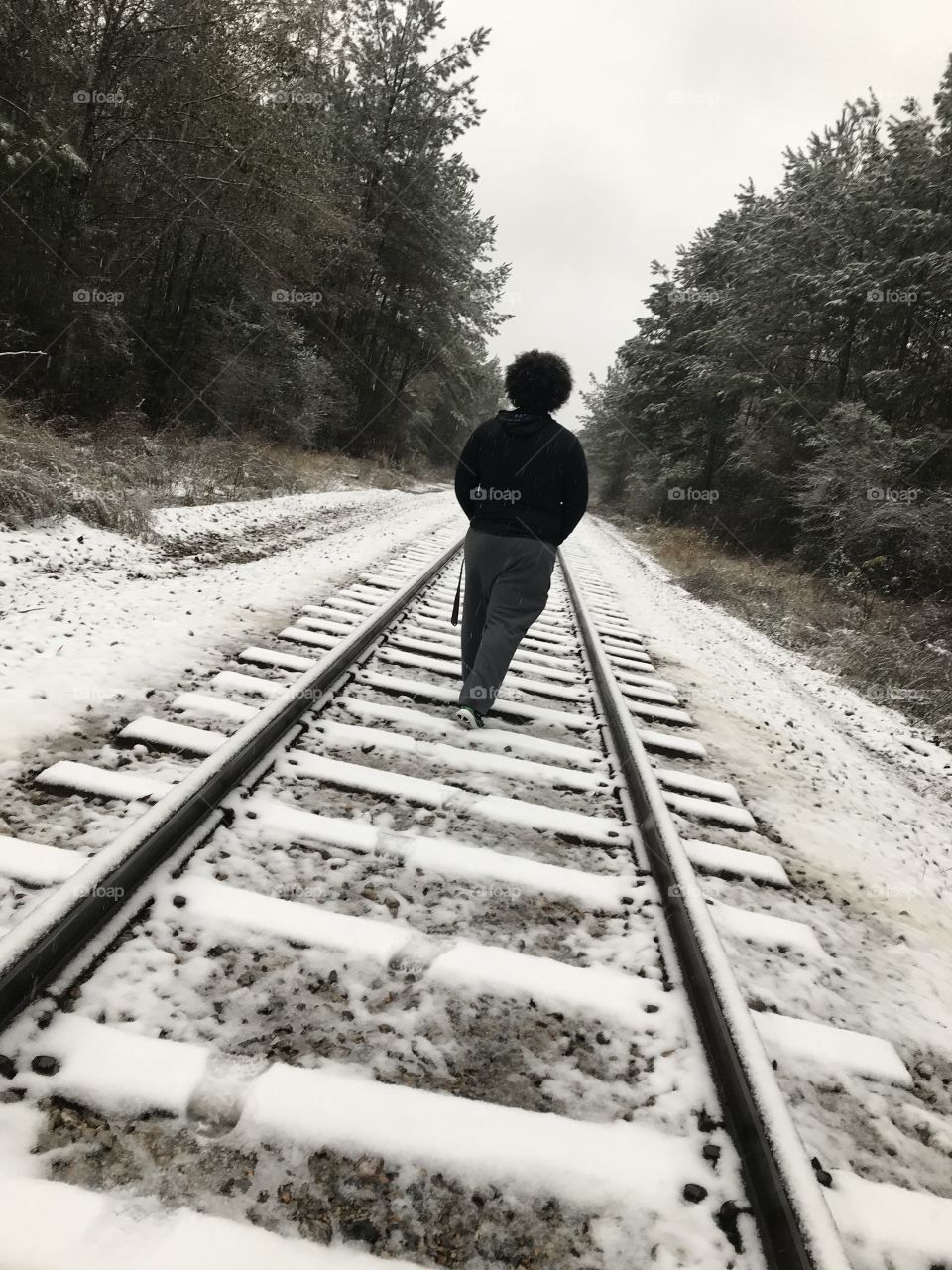 Railroad tracks covered in snow!