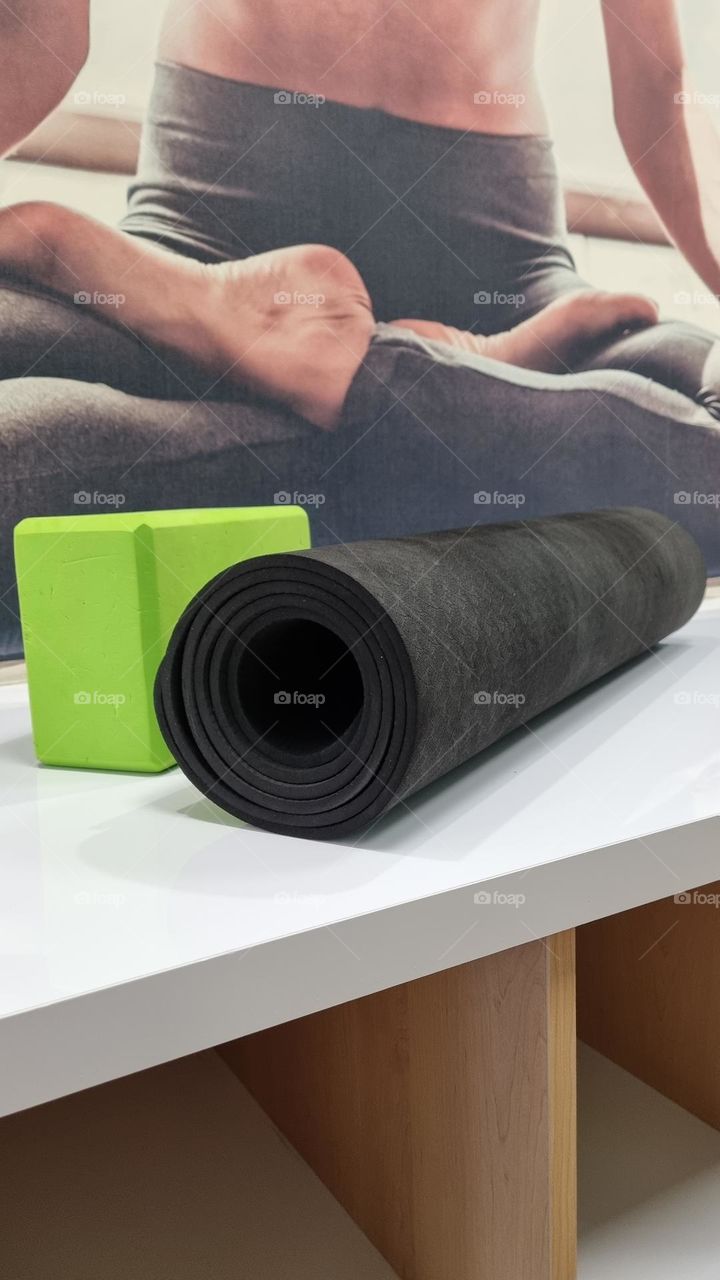 yoga mat and block in the yoga studio