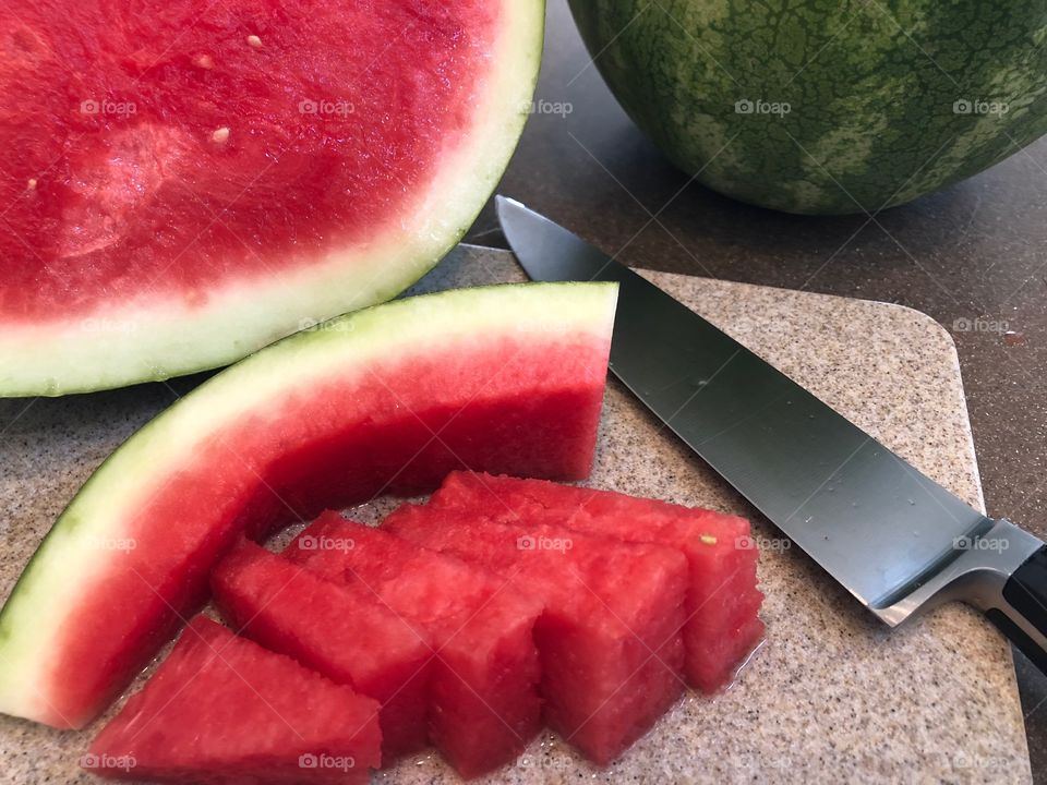 Watermelon slices with knife