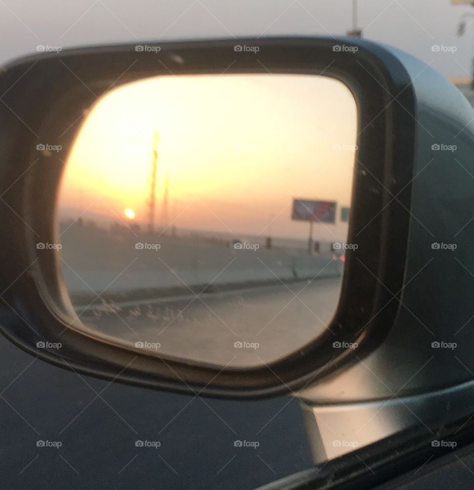 Sunset in side mirror 