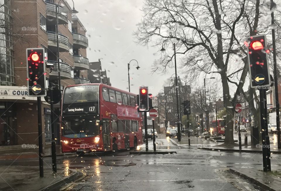 Red bus in the rain 