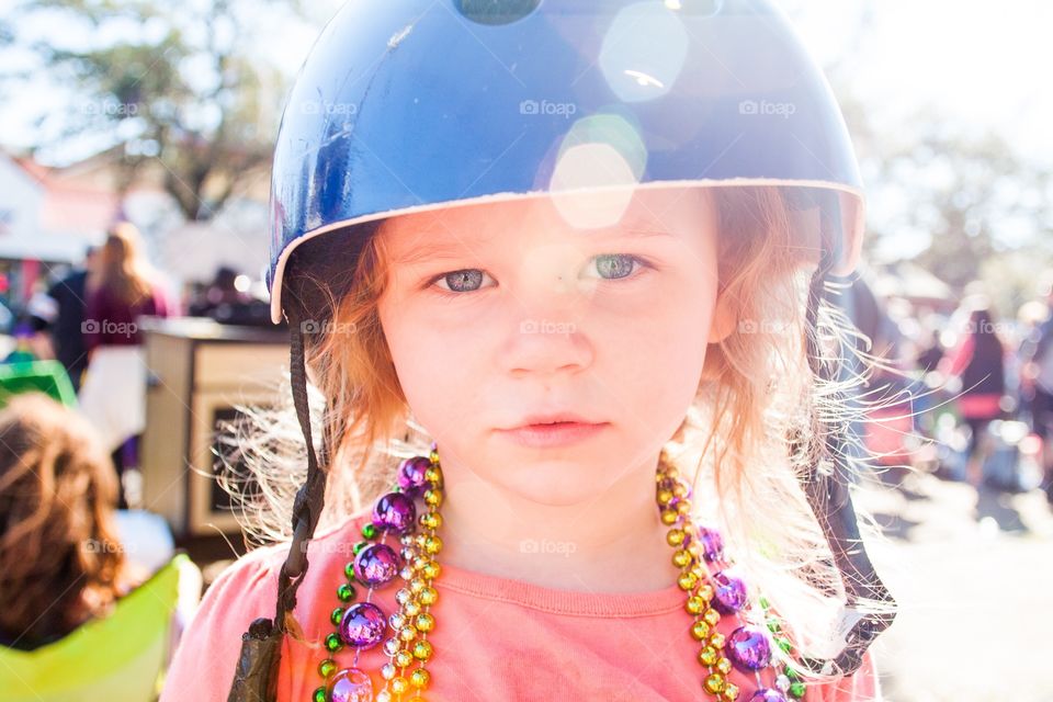 Girl with bike helmet and flare