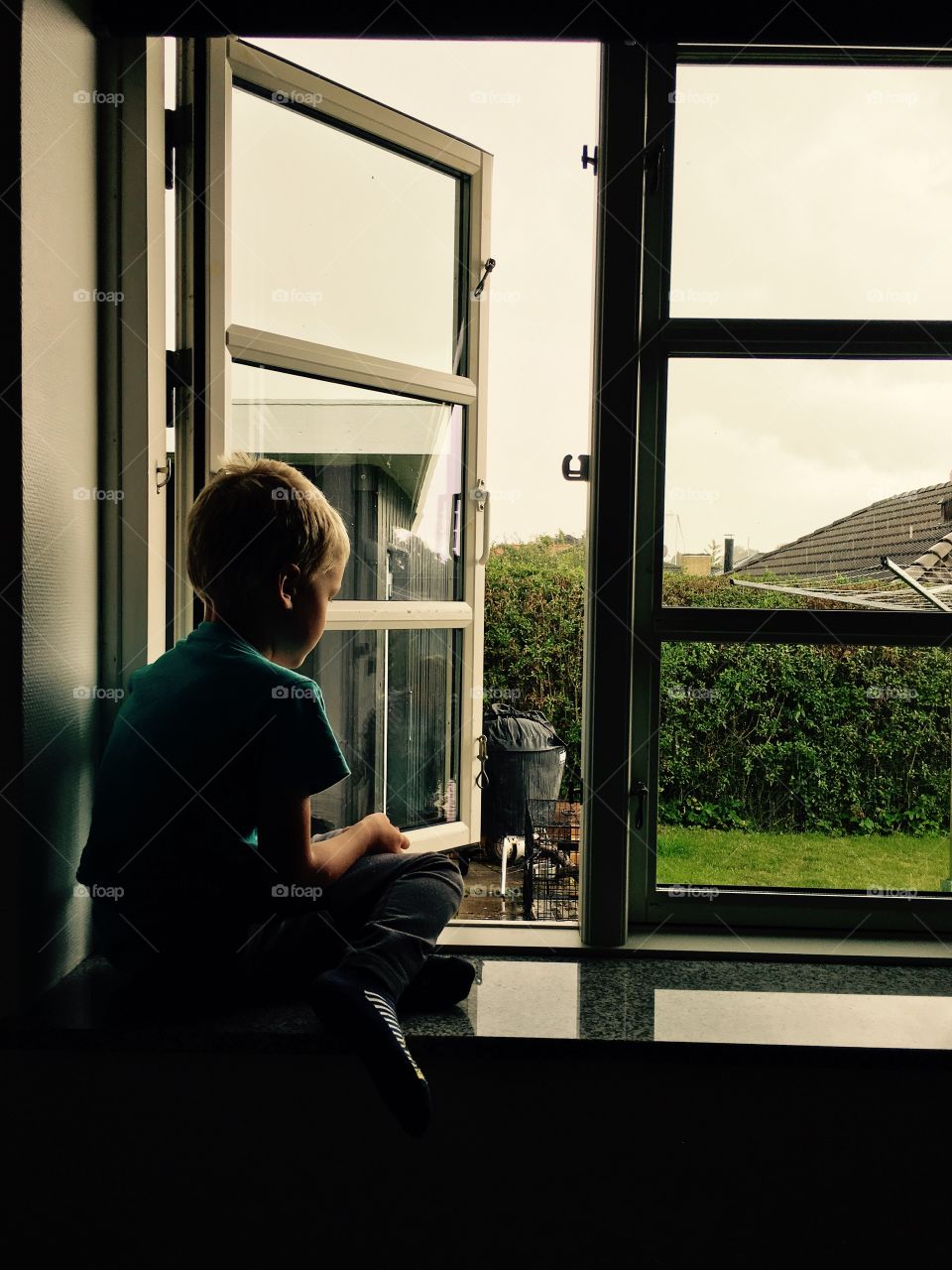 Boy in window 