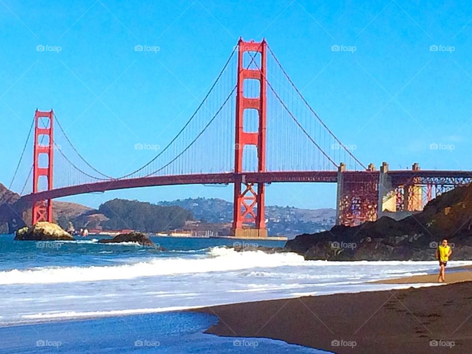 Man jogging close to Golden Gate Bridge 
