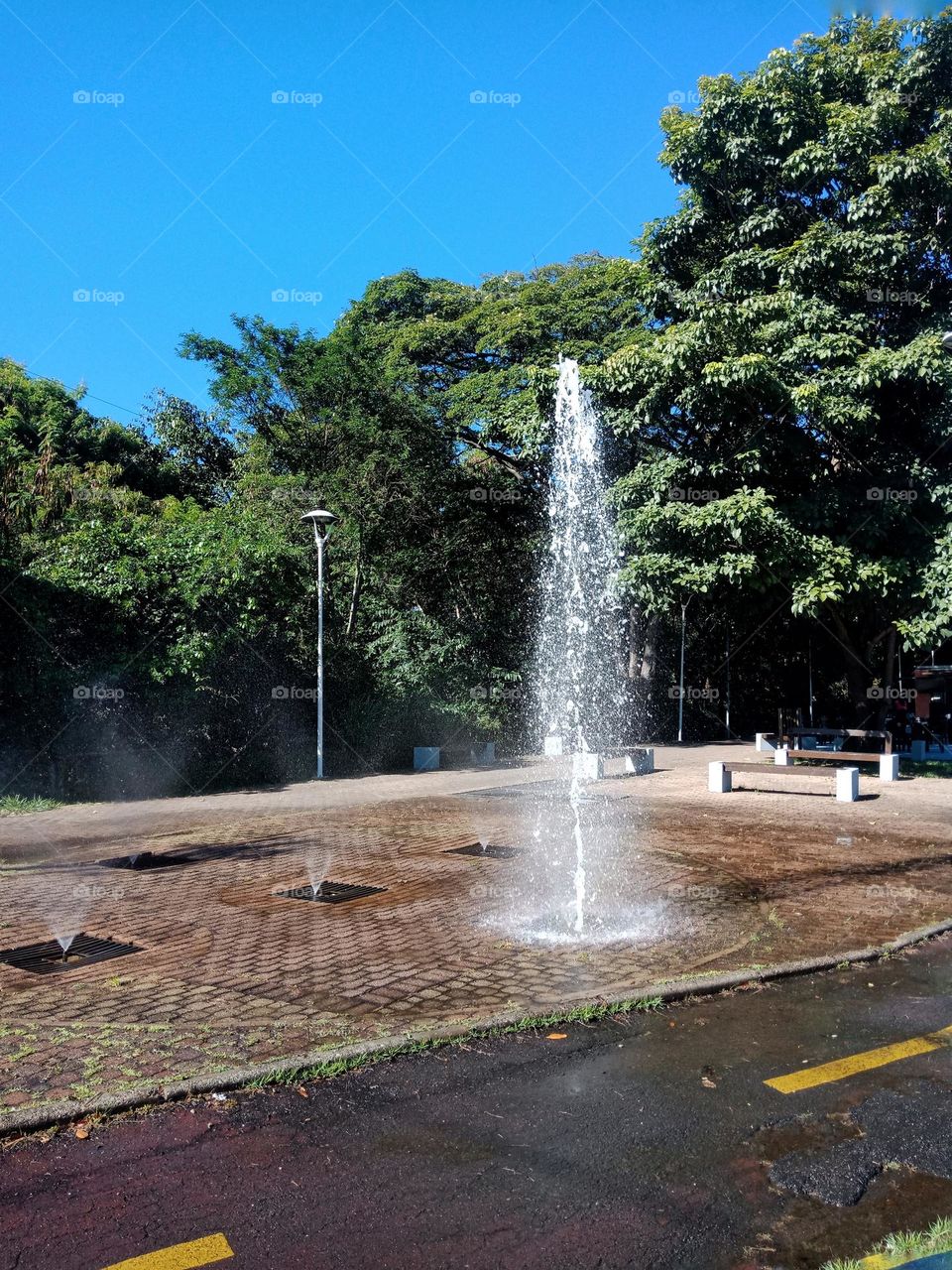 ground fountain in a walking path, Parque Linear Amparo-SP