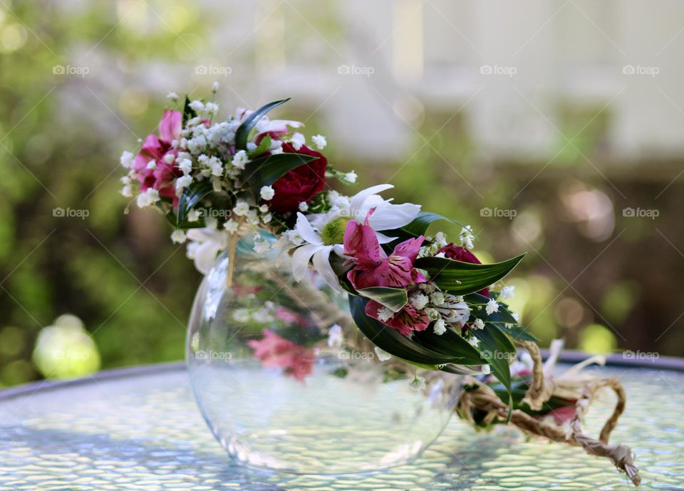Hawaiian Haku lei. I make these flower leis for my daughters to commemorate special occasions, like birthdays and graduations. 