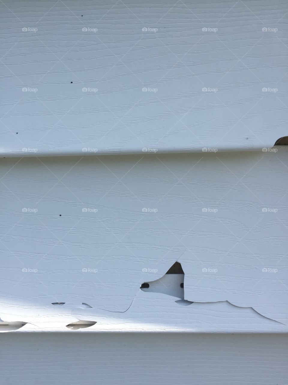 Broken siding