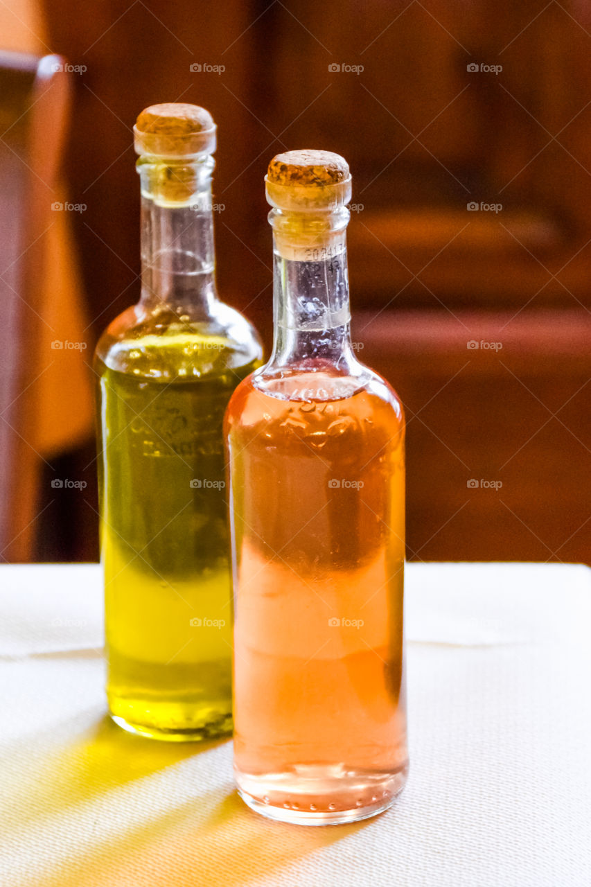 Close-up of glass bottle on table