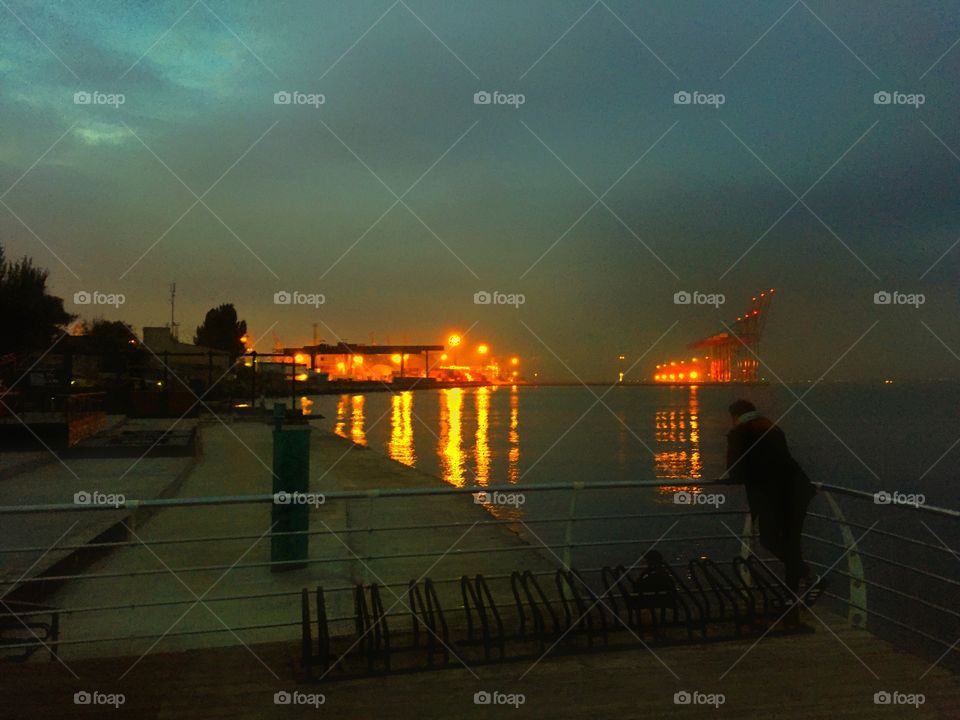 Port lights reflections on the water 