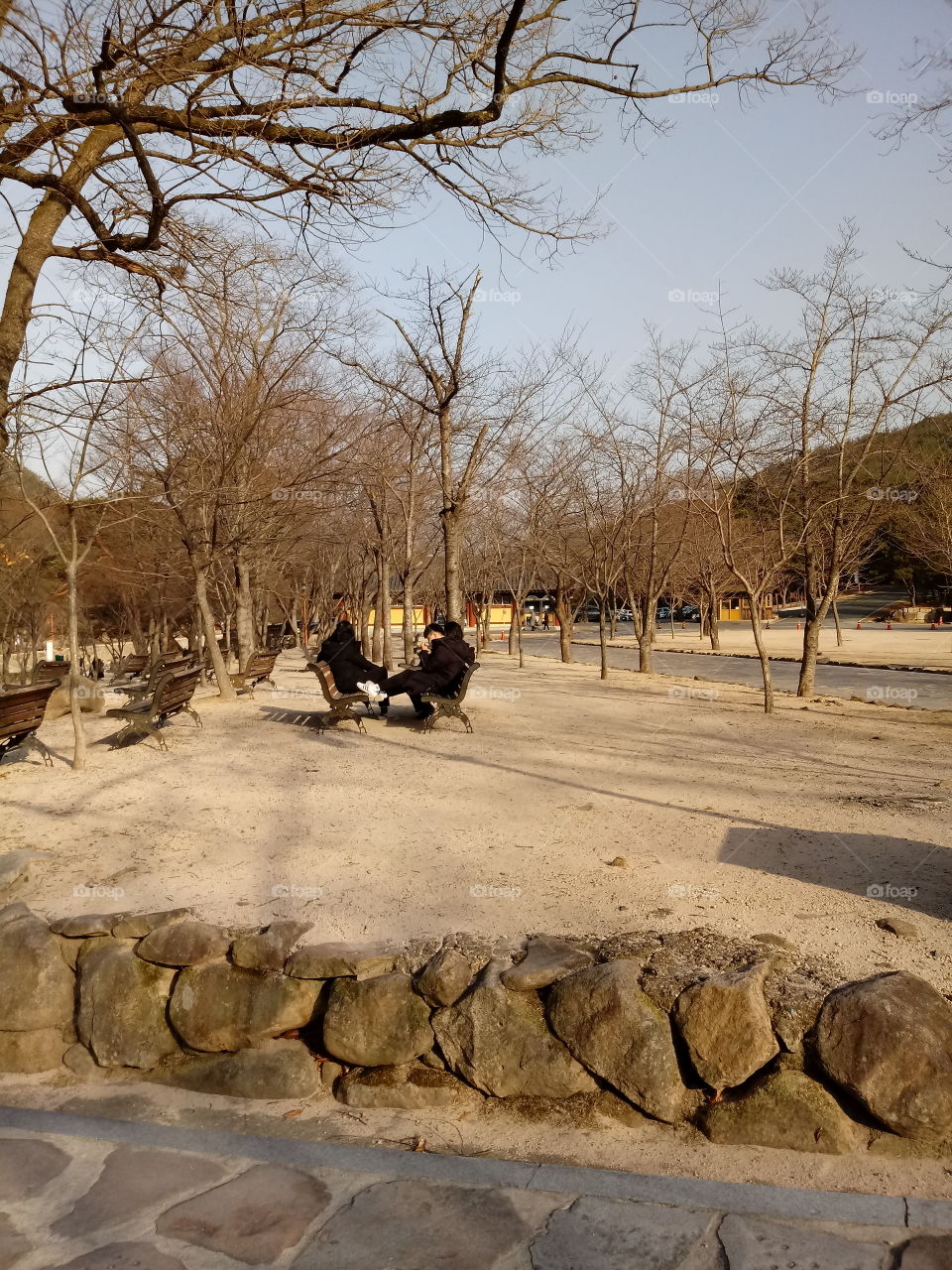 just sitting down for a little rest after the long walk as a walking exercise at the mountain.