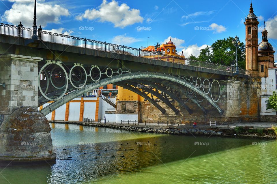 Triana Bridge. View of Triana Bridge and chapel of El Carmen, Sevilla, Spain.