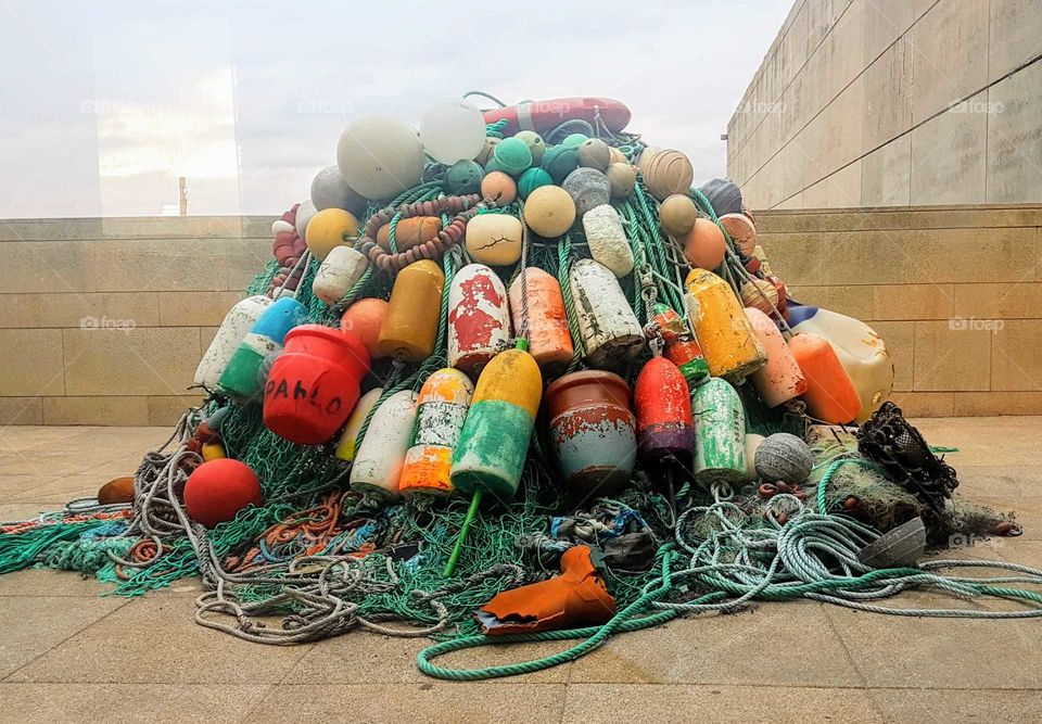 Huge pile of colourful buoys
