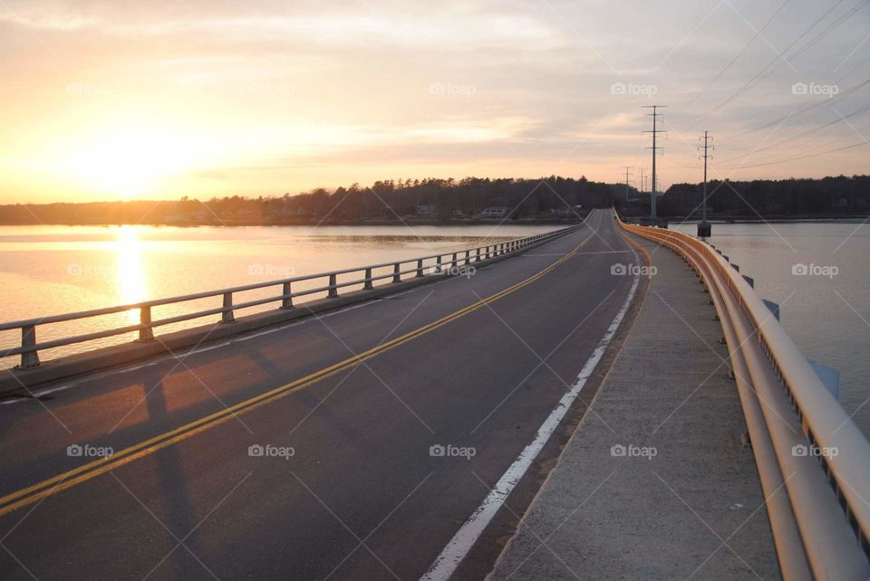 Twisting twining roads feeling that spring time warmth breeze through your hair as you cross over the bridge from one island to the other. you'll see different perspectives of different sides of the ocean. snodgrass bridge Yarmouth ME.