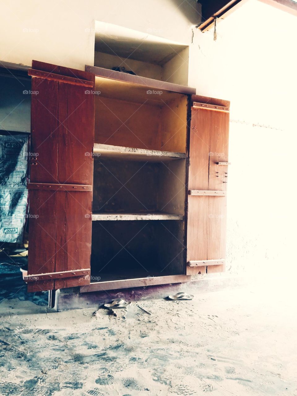 an empty closet during repair work.