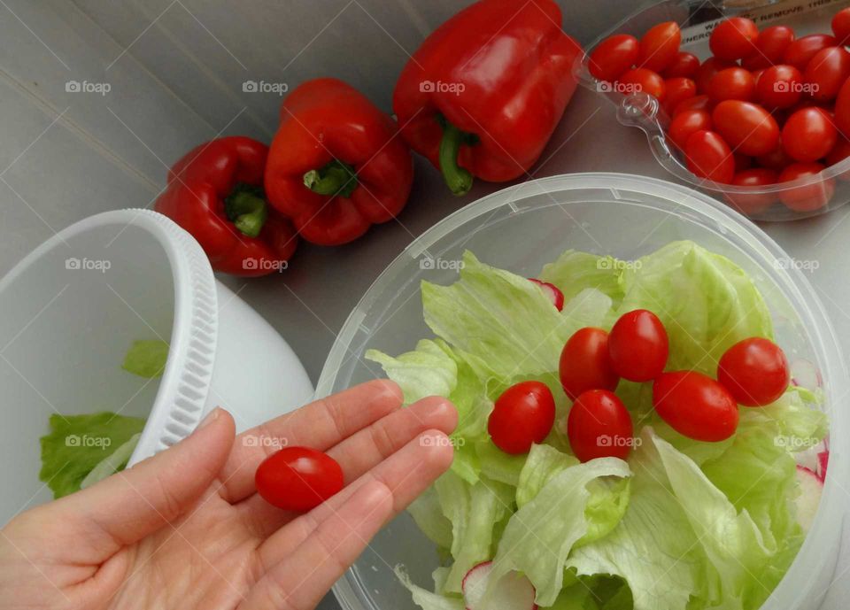 Woman prepare fresh salad