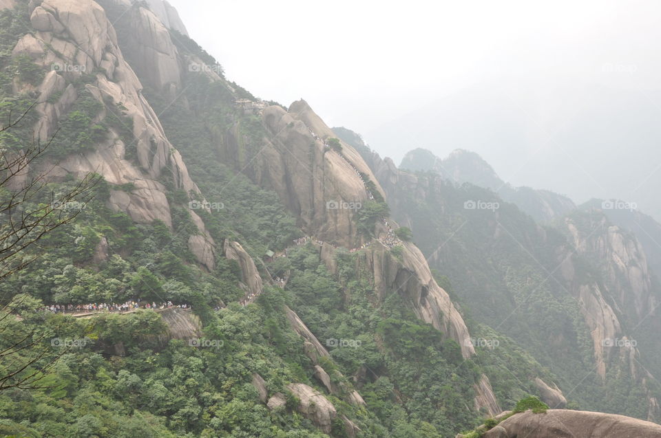 mountains with people looking like ants