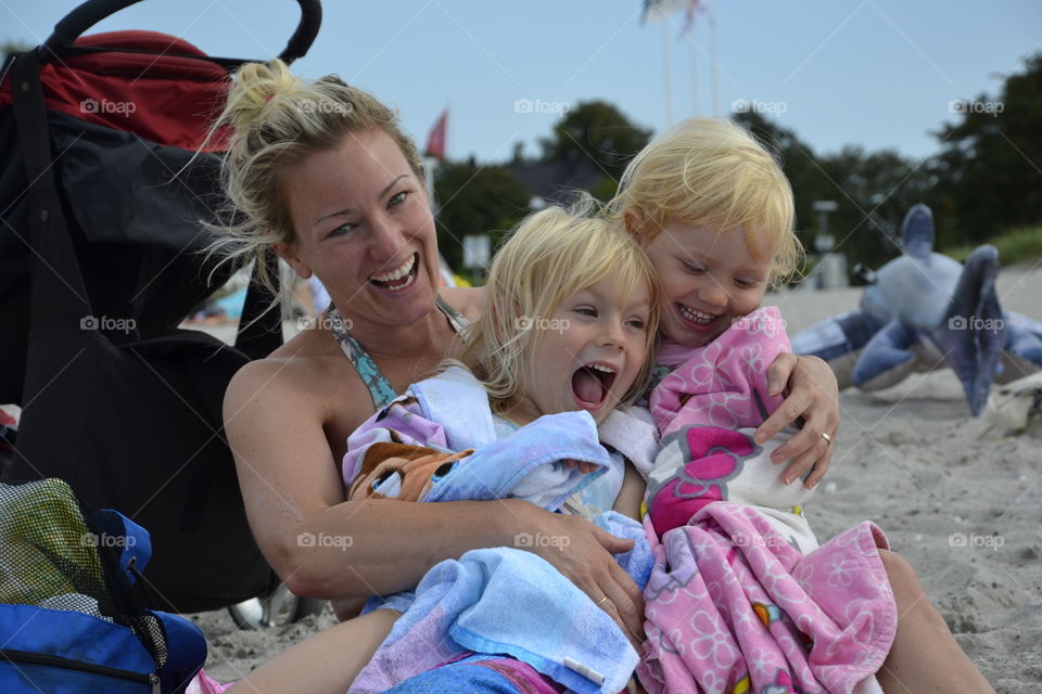 Happy family enjoying on beach