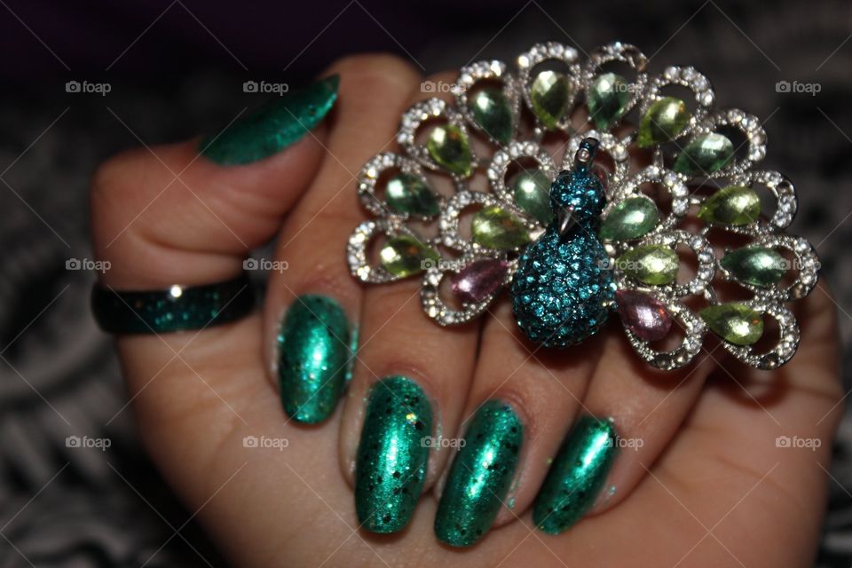 Glitzy peacock nails, something to dazzle the world 