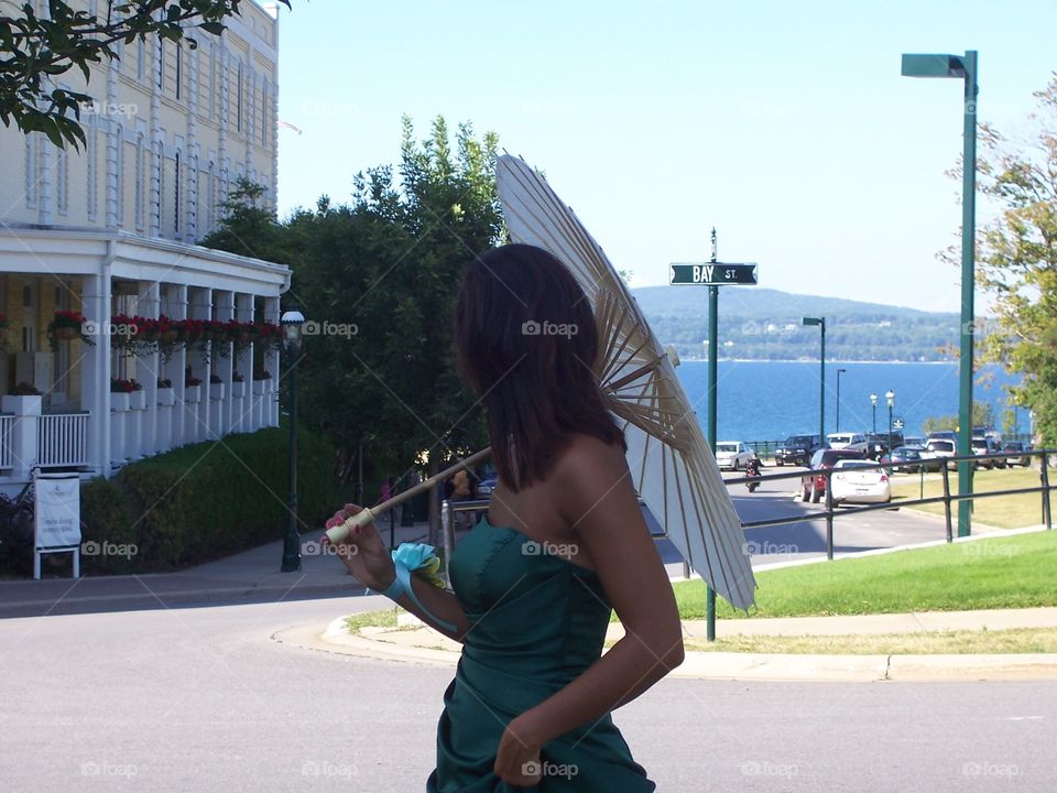 A woman is looking to her right, but at what, we don't know. Create your own story.