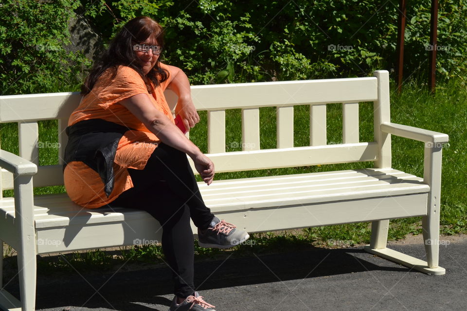 Woman on a bench.