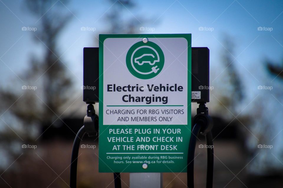 Electric vehicle charging sign