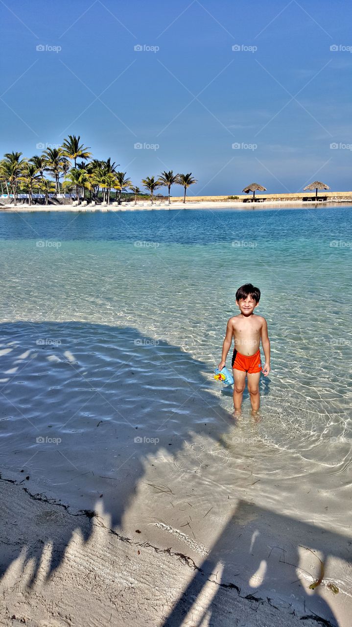 my cute baby boy spending time in his favorite place! the beach..