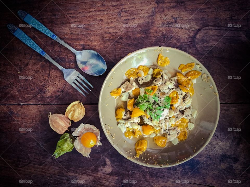 Steamed chicken breast with cape gooseberry
