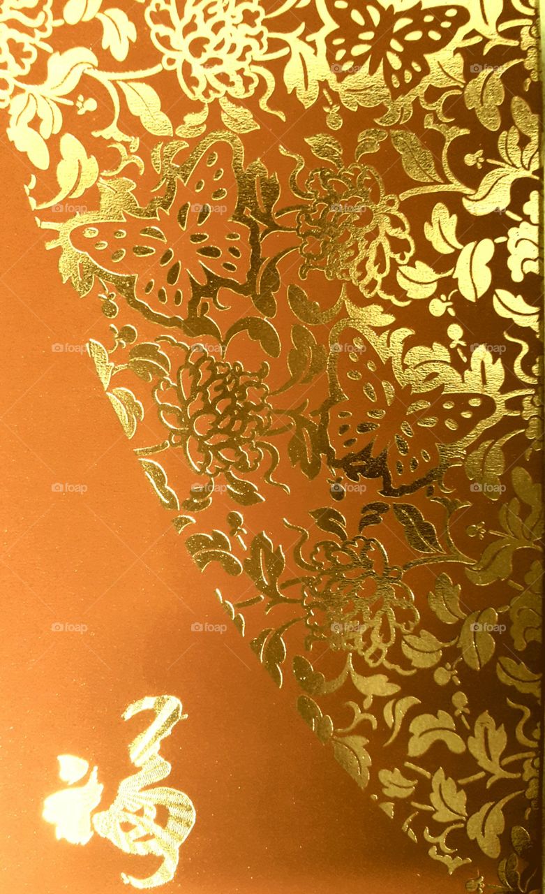 Singapore motifs used in a gift packet for money by an alumni association